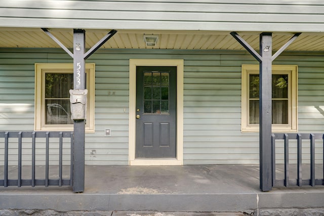 533 N Main St, Republic, MO 65738 - doorway to property with covered porch