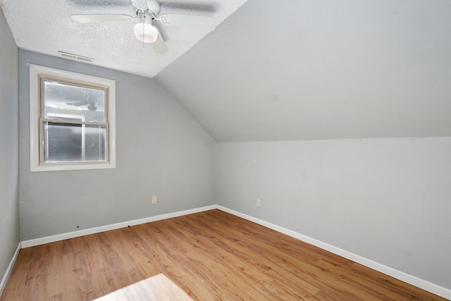 533 N Main St, Republic, MO 65738 - bonus room featuring wood finished floors, lofted ceiling, a ceiling fan, and a textured ceiling