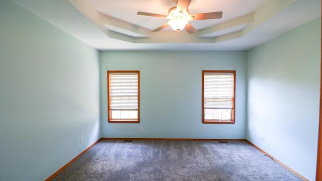 5546 S Aspen Dr, Battlefield, MO 65619 - empty room featuring carpet flooring, a raised ceiling, and ceiling fan