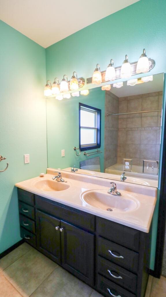 5546 S Aspen Dr, Battlefield, MO 65619 - bathroom with double vanity and tile patterned floors