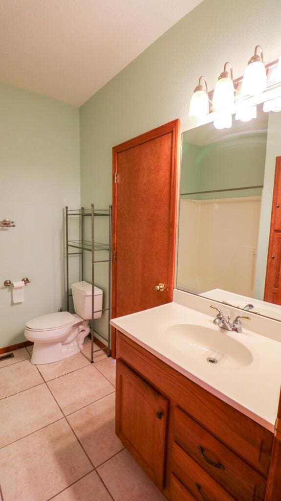 5546 S Aspen Dr, Battlefield, MO 65619 - full bathroom with vanity and tile patterned floors