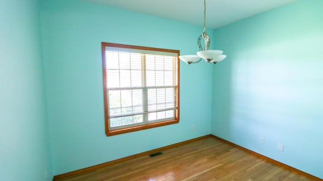 5546 S Aspen Dr, Battlefield, MO 65619 - spare room with wood finished floors and baseboards