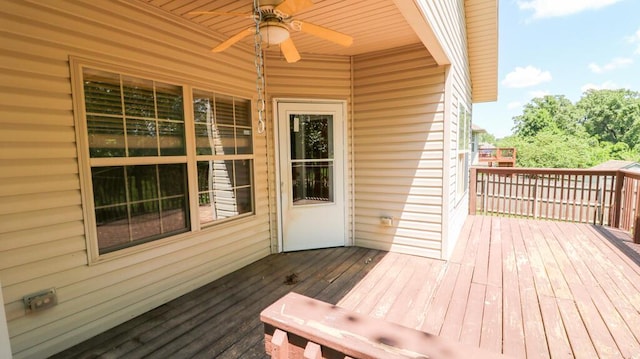 5546 S Aspen Dr, Battlefield, MO 65619 - deck featuring a ceiling fan