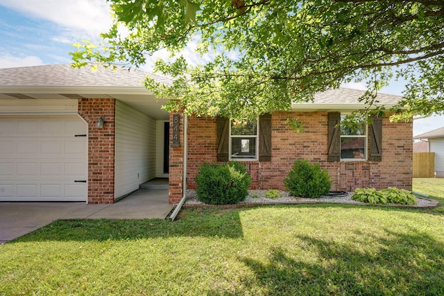 844 S Natalie Ave, Springfield, MO 65802 - ranch-style house with a front lawn, brick siding, an attached garage, and a shingled roof