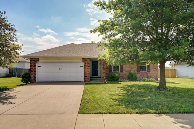 844 S Natalie Ave, Springfield, MO 65802 - view of front of home with a garage, concrete driveway, brick siding, and roof with shingles