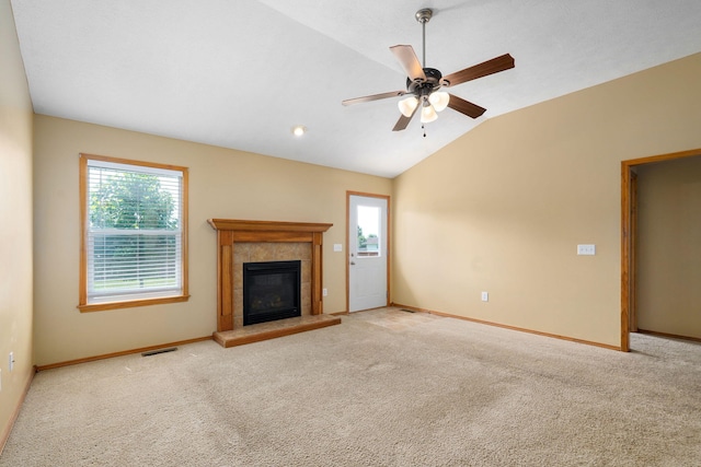 844 S Natalie Ave, Springfield, MO 65802 - unfurnished living room with vaulted ceiling, healthy amount of natural light, a fireplace, carpet flooring, and ceiling fan
