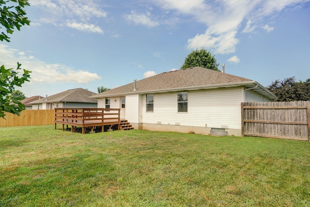 844 S Natalie Ave, Springfield, MO 65802 - back of property with a deck and a fenced backyard