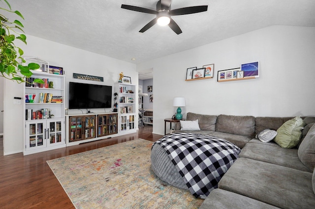 5055 E Cherry Pl, Springfield, MO 65809 - living room featuring wood finished floors, ceiling fan, and a textured ceiling