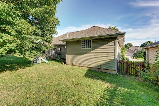 5055 E Cherry Pl, Springfield, MO 65809 - back of house featuring a shingled roof