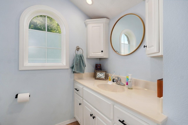 5055 E Cherry Pl, Springfield, MO 65809 - bathroom with vanity and vaulted ceiling