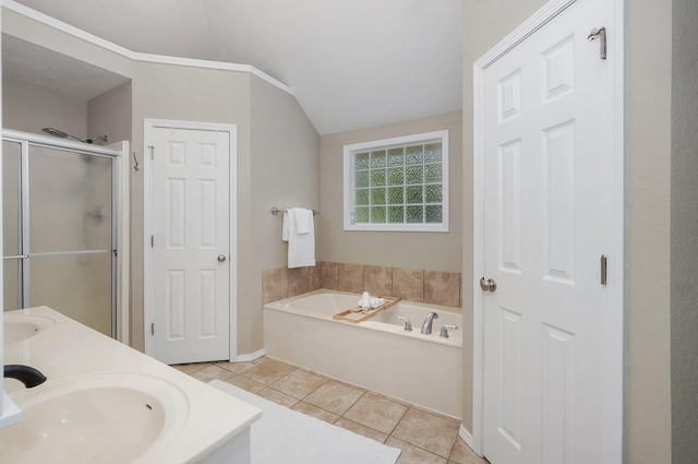 5055 E Cherry Pl, Springfield, MO 65809 - full bath with a bath, tile patterned floors, a shower stall, double vanity, and vaulted ceiling