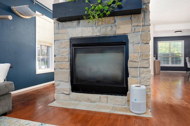 5055 E Cherry Pl, Springfield, MO 65809 - detailed view of wood finished floors and a fireplace