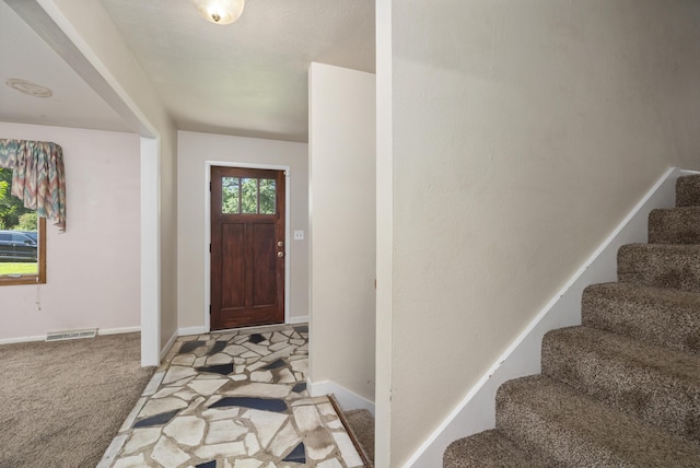 2266 E Barataria St, Springfield, MO 65804 - foyer entrance featuring stairway and carpet