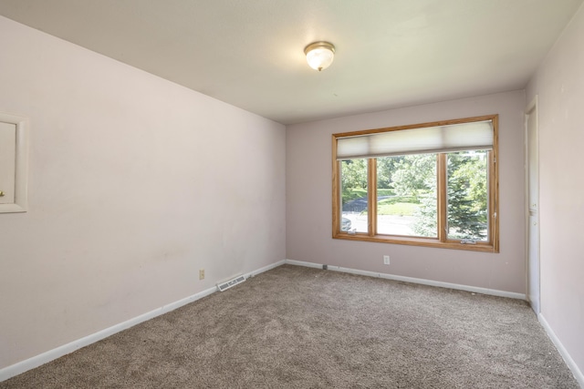 2266 E Barataria St, Springfield, MO 65804 - carpeted spare room with baseboards