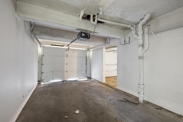 2266 E Barataria St, Springfield, MO 65804 - garage featuring a garage door opener