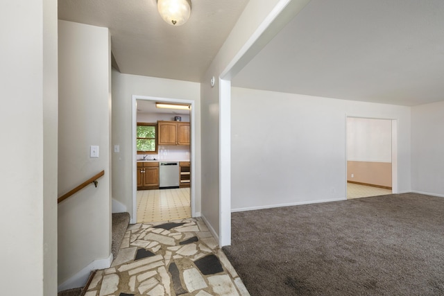 2266 E Barataria St, Springfield, MO 65804 - hallway with light colored carpet and baseboards