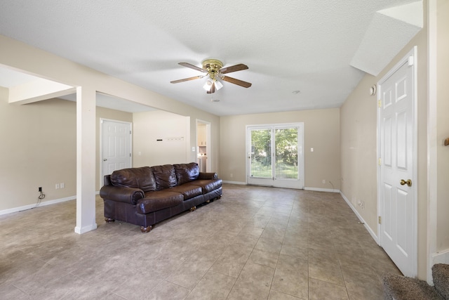 2266 E Barataria St, Springfield, MO 65804 - living area featuring ceiling fan, light tile patterned floors, and a textured ceiling