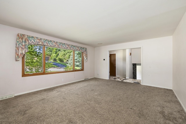 2266 E Barataria St, Springfield, MO 65804 - spare room featuring carpet flooring and baseboards