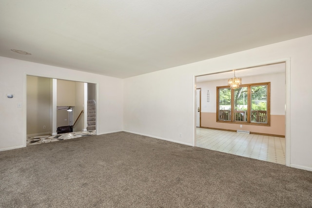 2266 E Barataria St, Springfield, MO 65804 - carpeted spare room featuring a chandelier and baseboards