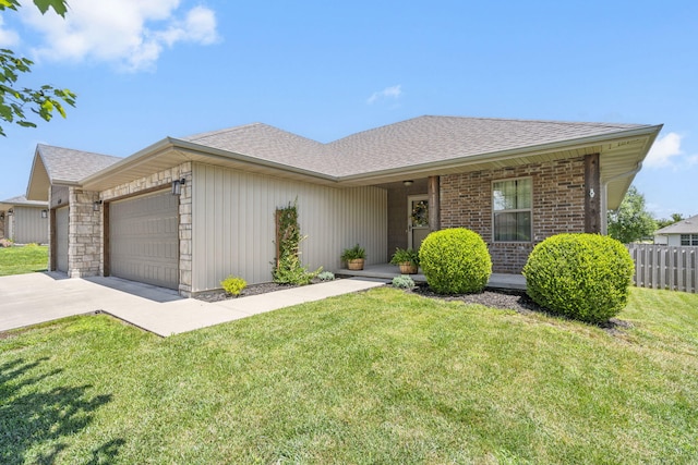 1950 S Trinidad Dr, Ozark, MO 65721 - view of front of property with an attached garage, driveway, a shingled roof, and brick siding