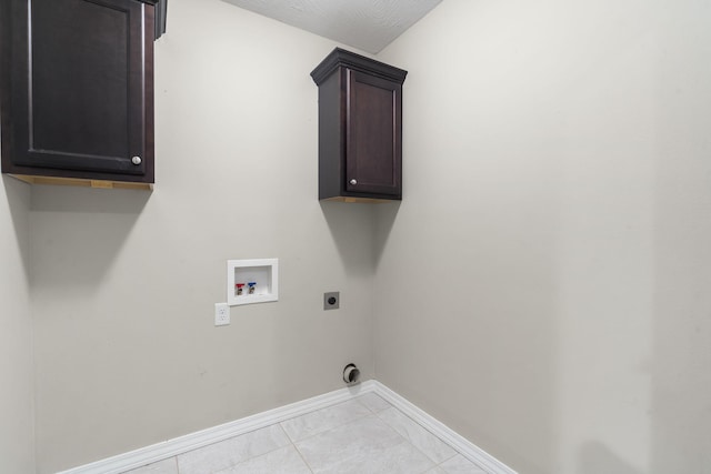 1950 S Trinidad Dr, Ozark, MO 65721 - washroom featuring electric dryer hookup, hookup for a washing machine, and cabinet space