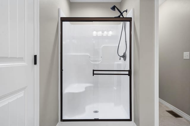 1950 S Trinidad Dr, Ozark, MO 65721 - full bath with a shower stall and baseboards