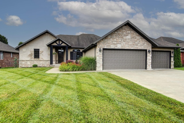 4604 E Kentbrook Dr, Springfield, MO 65802 - view of front facade with an attached garage, stone siding, a front lawn, driveway, and stucco siding