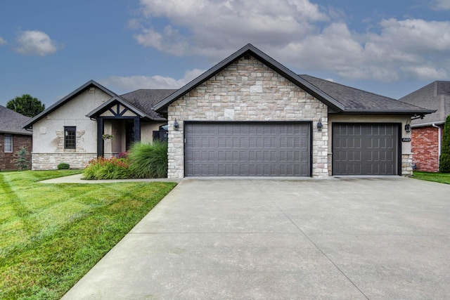 4604 E Kentbrook Dr, Springfield, MO 65802 - view of front facade featuring a garage, concrete driveway, stone siding, a front yard, and roof with shingles