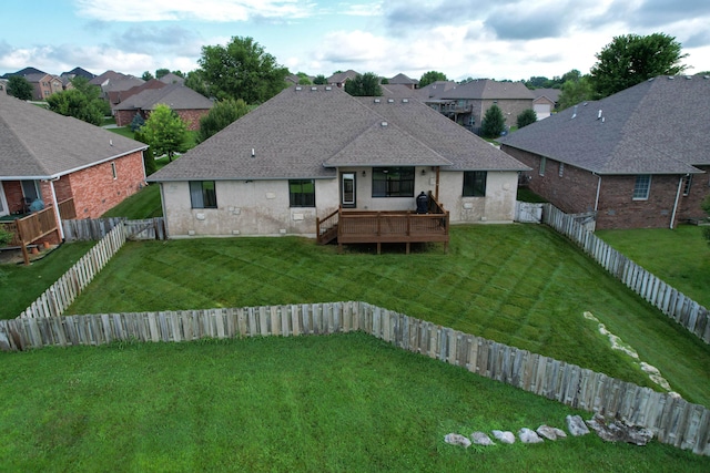 4604 E Kentbrook Dr, Springfield, MO 65802 - rear view of property with a wooden deck, a fenced backyard, a residential view, and a shingled roof
