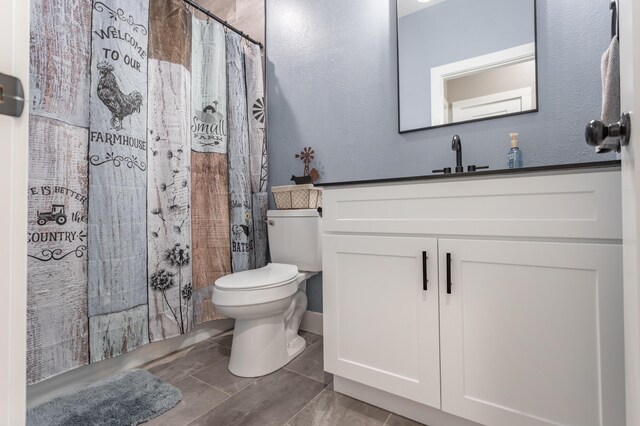 622 N Dean Ln, Republic, MO 65738 - full bathroom featuring vanity, a textured wall, and curtained shower