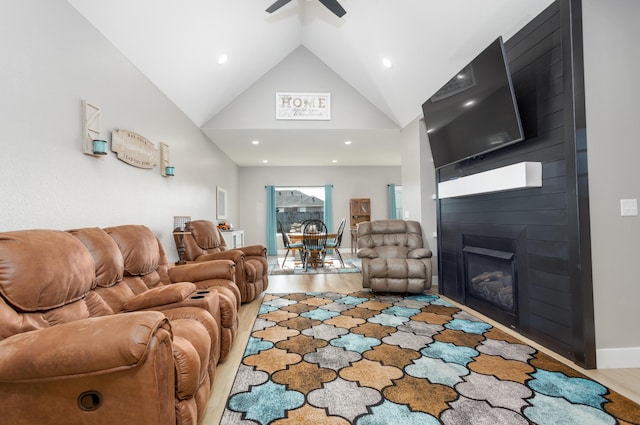 622 N Dean Ln, Republic, MO 65738 - living area featuring ceiling fan, recessed lighting, lofted ceiling, wood finished floors, and a fireplace