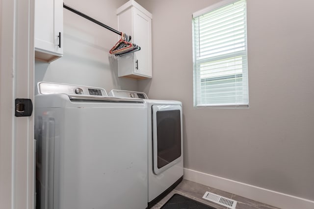 622 N Dean Ln, Republic, MO 65738 - washroom featuring separate washer and dryer, cabinet space, and tile patterned flooring