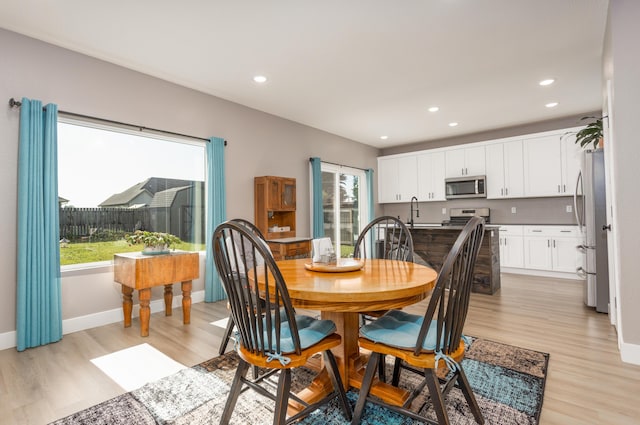 622 N Dean Ln, Republic, MO 65738 - dining area featuring light wood-type flooring and recessed lighting