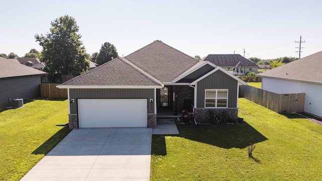 622 N Dean Ln, Republic, MO 65738 - view of front facade featuring a garage, stone siding, concrete driveway, roof with shingles, and board and batten siding