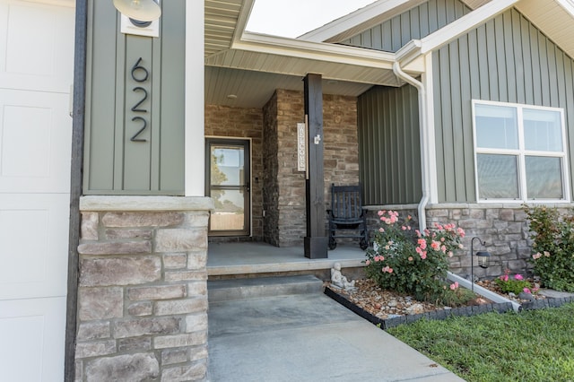 622 N Dean Ln, Republic, MO 65738 - entrance to property with stone siding, board and batten siding, and covered porch