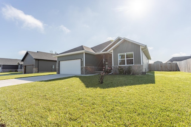 622 N Dean Ln, Republic, MO 65738 - single story home featuring concrete driveway, a garage, and board and batten siding