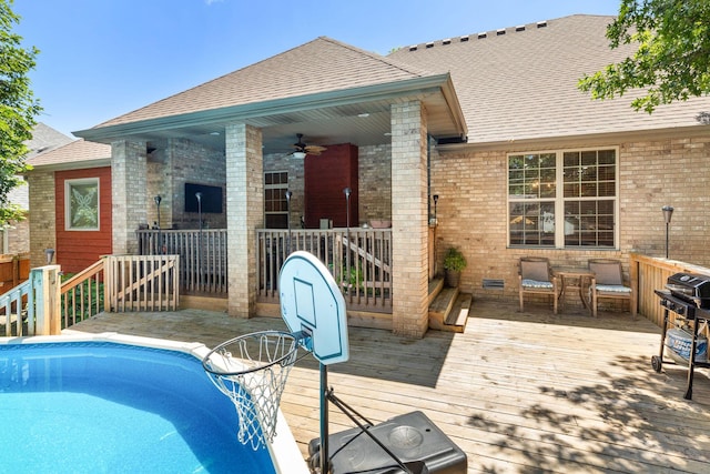 217 E Grace St, Republic, MO 65738 - swimming pool with a deck and a ceiling fan