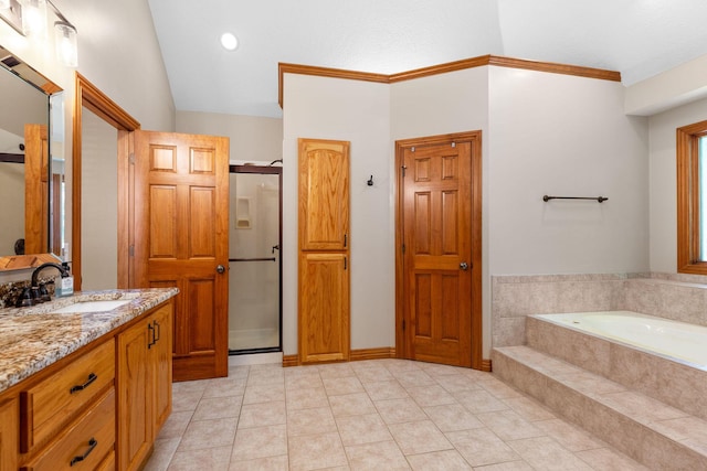 217 E Grace St, Republic, MO 65738 - bathroom with vanity, a bath, a stall shower, tile patterned flooring, and lofted ceiling