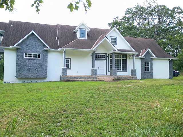 6540 Gateway Dr, Joplin, MO 64804 - view of front of property featuring stone siding, stucco siding, a front yard, and a shingled roof