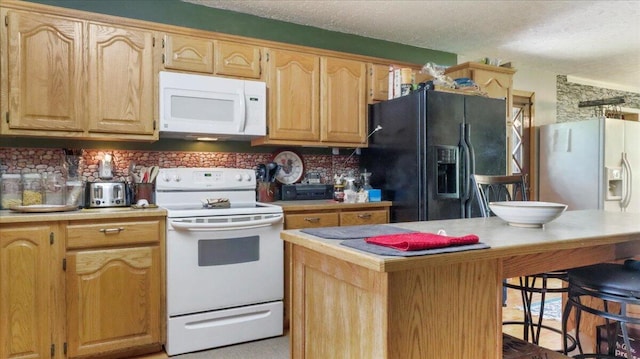 1339 W Business Highway 60-63, Willow Springs, MO 65793 - kitchen with white appliances, decorative backsplash, light countertops, and a textured ceiling