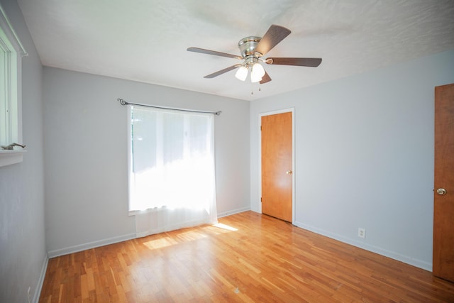 619 Rte H, Greenfield, MO 65661 - unfurnished bedroom featuring wood finished floors and ceiling fan