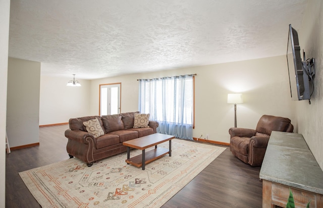 619 Rte H, Greenfield, MO 65661 - living room with dark wood finished floors and a textured ceiling