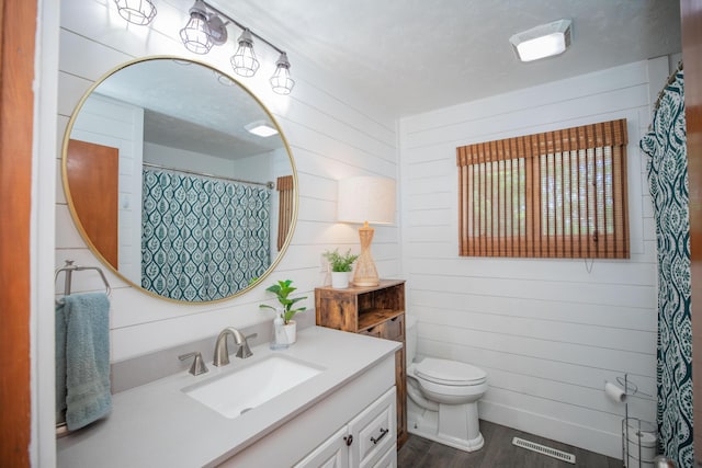 619 Rte H, Greenfield, MO 65661 - full bathroom featuring vanity, wood finished floors, and wood walls