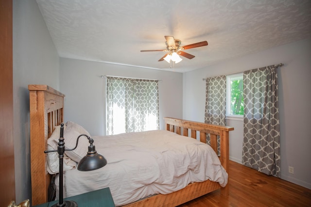 619 Rte H, Greenfield, MO 65661 - bedroom with wood finished floors and ceiling fan