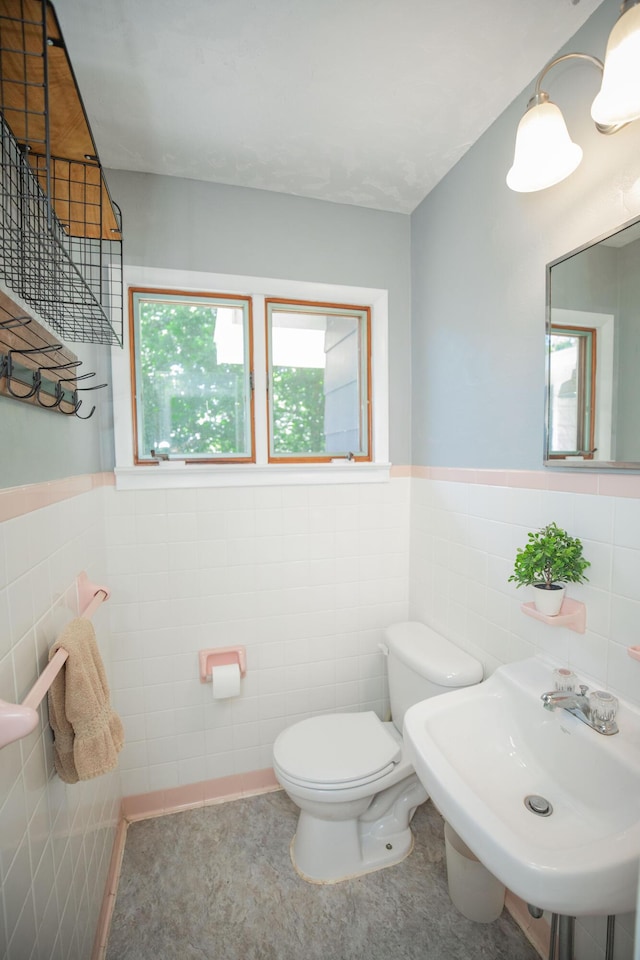 619 Rte H, Greenfield, MO 65661 - half bathroom with tile walls and a wainscoted wall