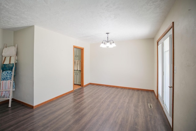 619 Rte H, Greenfield, MO 65661 - spare room with wood finished floors, a chandelier, and a textured ceiling