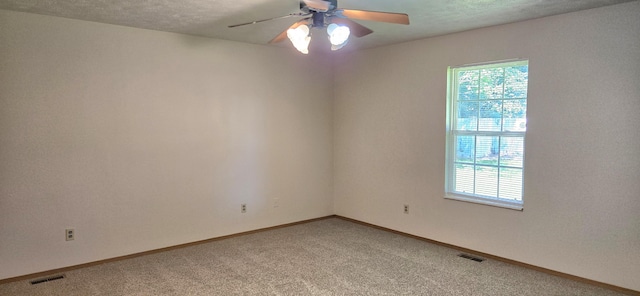2830 N Washington Ave, Springfield, MO 65803 - empty room featuring light carpet and ceiling fan