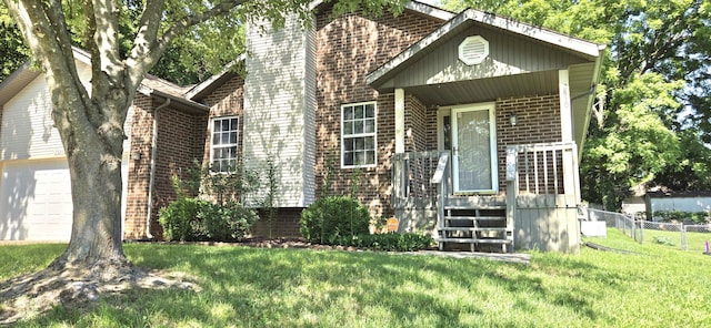 2830 N Washington Ave, Springfield, MO 65803 - view of front of property featuring brick siding and a garage