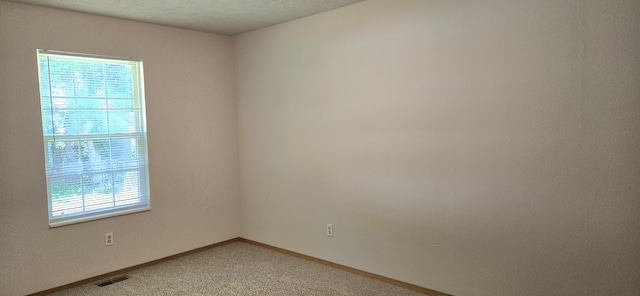 2830 N Washington Ave, Springfield, MO 65803 - empty room with light colored carpet and baseboards