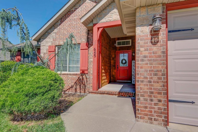 645 Galileo Dr, Nixa, MO 65714 - property entrance with brick siding